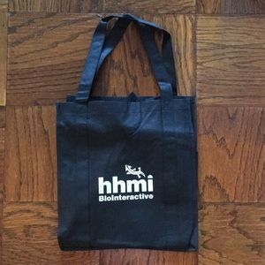 FREE w/$10 purchase. Large tote bag.